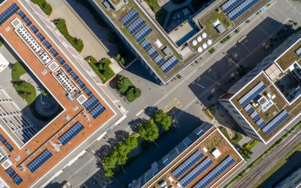 Bird’s eye view of solar panels on flat roofs